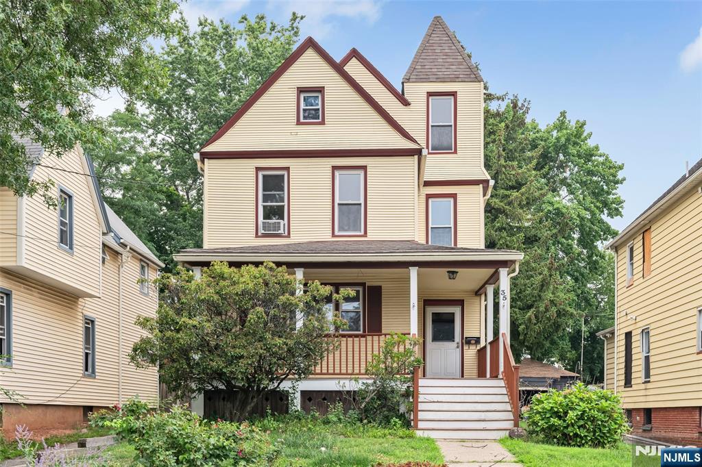 Step into the timeless charm of this classic Victorian, where original character meets today's comforts in the heart of downtown Dumont. A welcoming front porch sets the stage for this spacious home, rich with original details and timeless appeal. Inside, generous living spaces are complemented by an updated kitchen and baths, offering comfort for everyday living. Upstairs, you'll find three spacious bedrooms plus access to a massive unfinished attic ready to be transformed into additional living space, a home office, studio, or whatever your needs may be. Outside, the rear deck and level backyard offer room to relax or play, while the detached two-car garage provides valuable storage and off-street parking. Enjoy all that Dumont has to offer, including its strong sense of community, beautiful parks, recreation programs, local shops and dining, and convenient access to major highways and New York City. A wonderful opportunity to own a home with character, space, and endless potential.