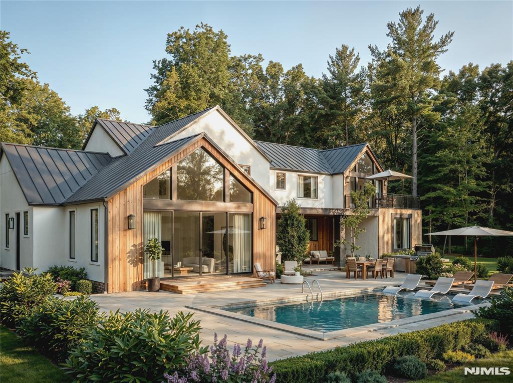 Perched on Demarest East Hill, one of a kind new construction nestled on a quiet tree-lined street and backing to a protected nature preserve This stunning custom home offers luxury, privacy, and modern design. Features include oversized European windows, a chefâ€™s kitchen with Sub-Zero and Wolf appliances, and a spa inspired primary suite Resort style outdoor living awaits with a covered patio pool spa and beautifully landscaped grounds creating the perfect private retreat in one of Bergen Countyâ€™s most sought after neighborhoods, enjoy award winning school districts, conveniently 8 miles to George Washington Bridge