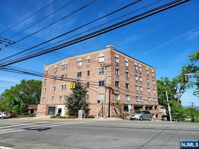 Built in 2003 on Bergen BLVD. Conveniently located - close to major highway, schools, shops. 2 bedrooms & two full bathrooms. two indoor parking spaces (6 & 30). Modern kitchen with granite counter tops, stainless steel appliances. Hardwood floors thu-out. 9 feet high ceiling. Washer & dryer in unit. Must see.