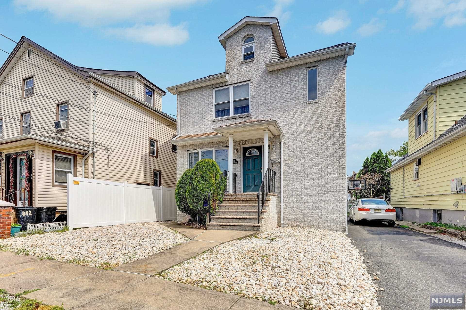 Updated and modern 2 Family home with separates utilities, great for investor or owner occupant! First unit consists of 2 levels of living space located on the first and second floor. The first floor features a large open floor plan with living room, dining area, eat-in kitchen and half bath. The second floor has 3 large bedrooms, 2 full baths and access to large attic. The other rental is a basement unit with separate entrance. Features living room, eat-in kitchen, one bedroom and one full bath. Other property highlights include: hardwood and tiling flooring throughout, central air, granite counters on 1st floor kitchen, brick faced, paver patio, shed, fenced in yard and 3 cars tandem off street parking in driveway.