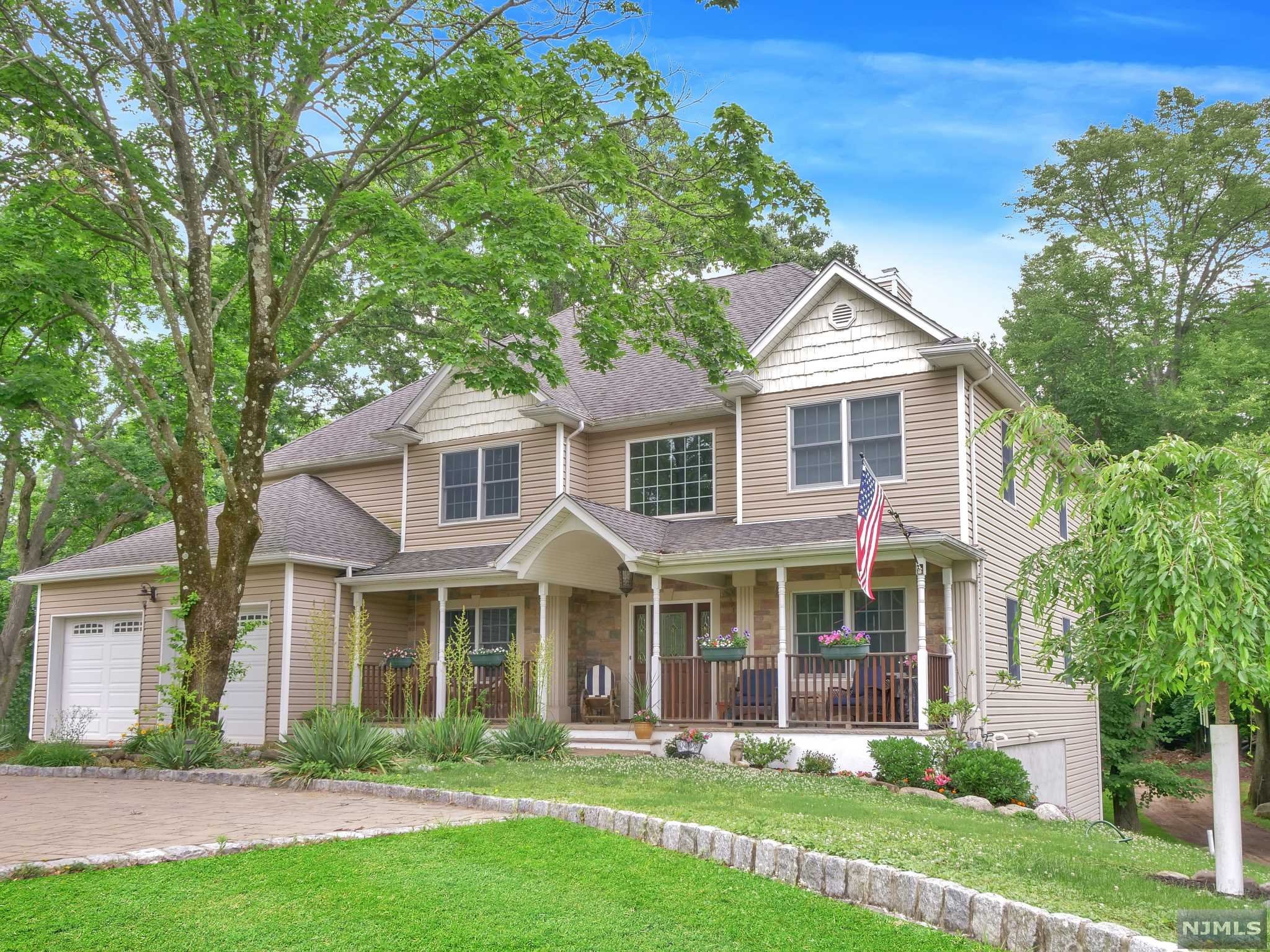 Custom Center Hall Colonial boasting over 3700 square feet! This home is situated on just about 1 acre of land and offers great curb appeal. Greet your guest in the grand 2-story entry foyer which leads to the formal living room and formal dining room. The great room is located just beyond the foyer and offers high ceilings, floor to ceiling fireplace and large windows that allow natural light to fill the room. Gleaming hardwood floors run throughout the entire home. Tastefully updated powder room is located off of the great room. Gorgeous kitchen offers Jen-air stainless steel appliances, custom cabinetry, center island, breakfast bar and granite countertops. The separate dining area is spacious & offers sliders that lead to the deck. 2 bedrooms & full bathroom complete the first floor. Retreat upstairs to find 4 bedrooms & 2 full bathrooms, including the primary suite. The primary bedroom is spacious & offers tray ceilings, large walk-in closet and sitting room.