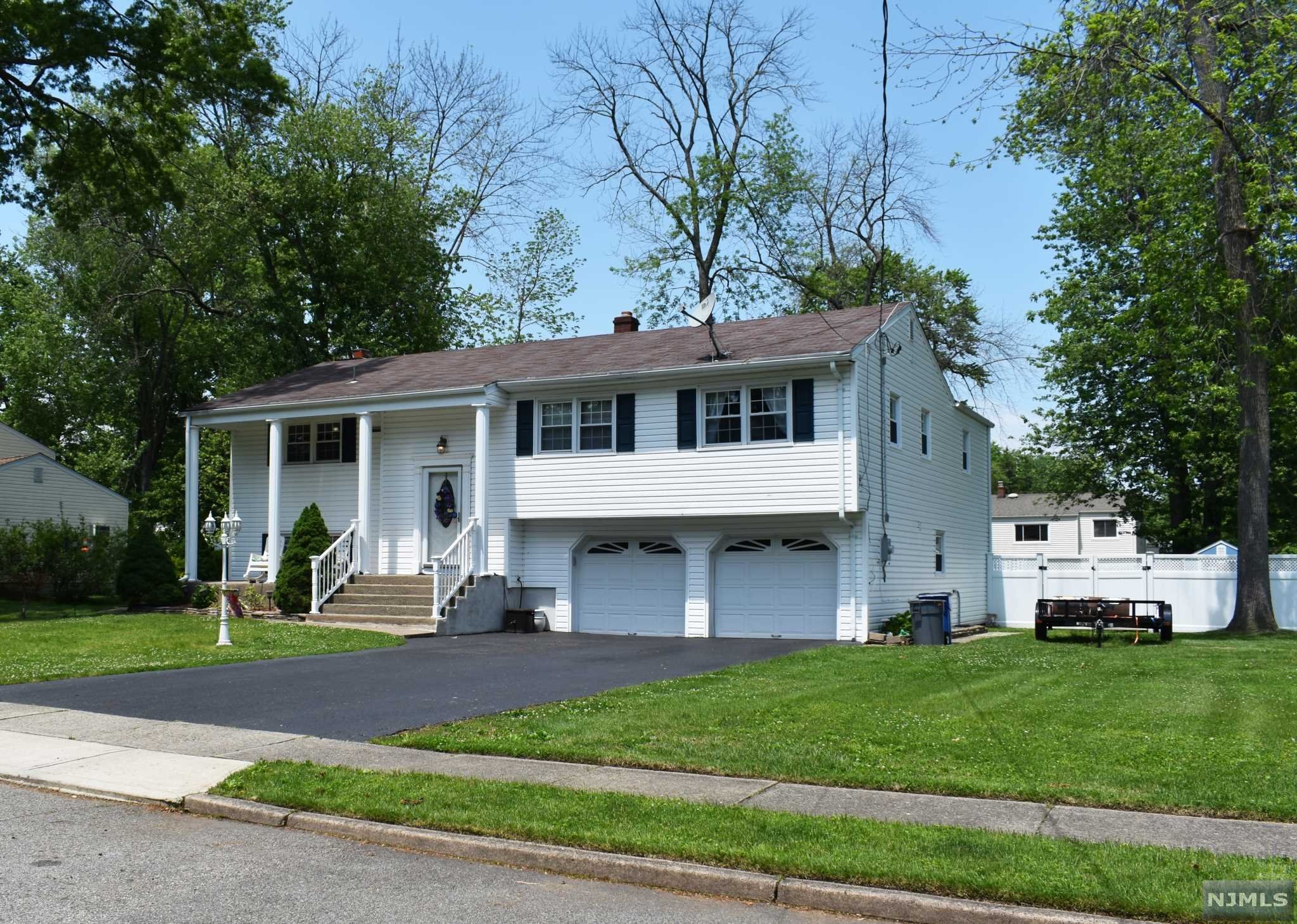 Expanded Bi-Level courtesy of a Primary Bedroom addition off rear of home giving a bonus room on ground level. All 4 bedrooms on main level! Primary has a dual closet, door to hall full bath, and a slider that leads to the deck. Renovated in 2012- Open floor plan kitchen boasts stainless steel appliances and granite countertops. Family room features wood-burning fireplace and a half-bath just off of it. Outside of the home= PVC fenced in rear yard, 2 sheds and an above ground pool that was installed in 2020 is ambient-air heated salt-water.
