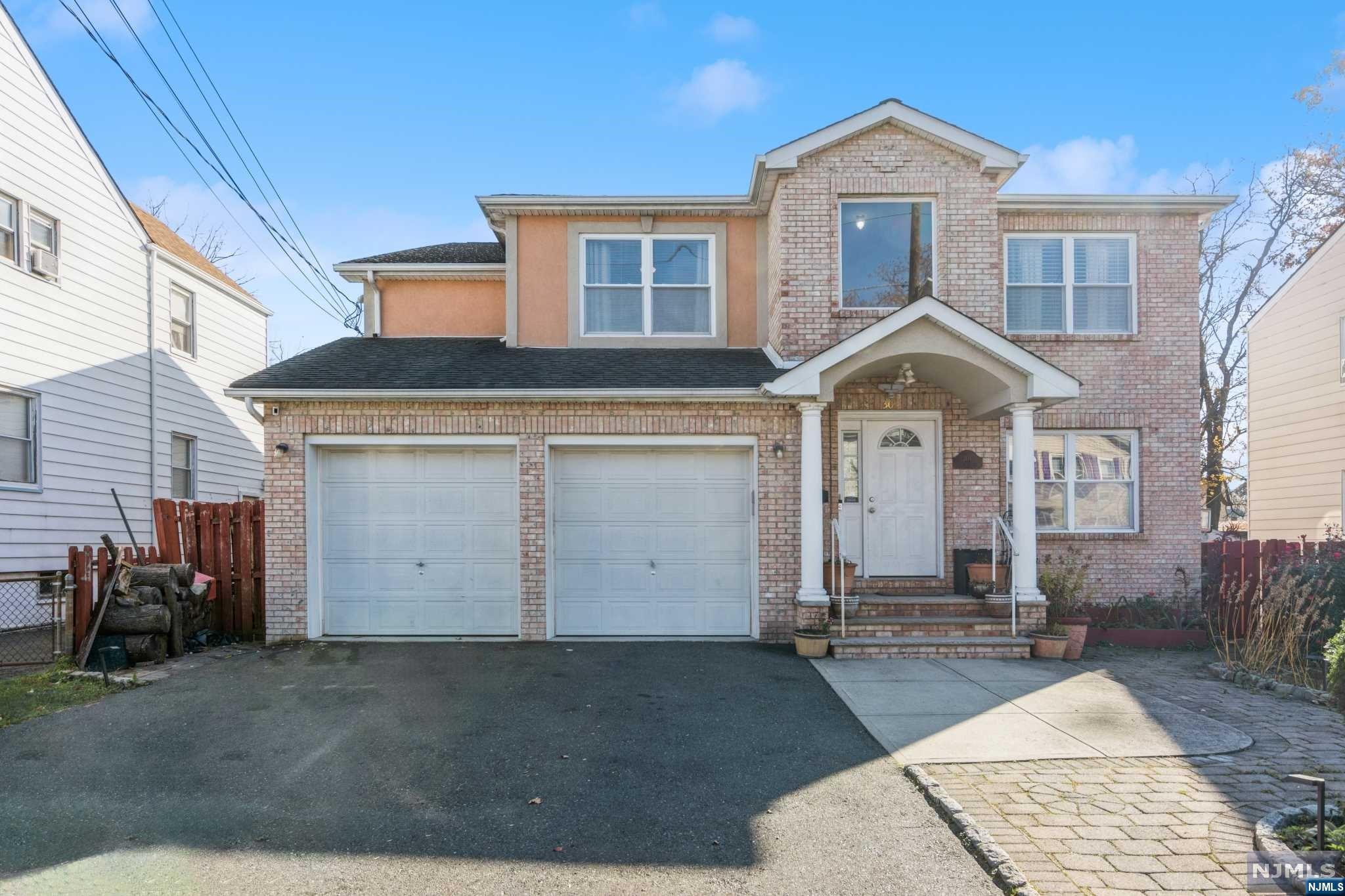 Introducing this exceptional 2-Family just 20 miles fr the vibrant energy of NYC. This prty ensures lasting value & appeal. Step into a newly painted home w/polished wood flrs thruout. The 1st flr features a well-balanced layout, incl'ng a spacious LR, a welcoming DR, a Full Bathrm & a generously sized EIK-Perfect for comfort. The 3 inviting Br's on the 1st flr, are bathed in natural light & offer ample closet space.The main Bedrm is a true retreat w/en-suite Bathrm featuring a jetted tub & shower. On the 2nd flr, find a spacious LR & DR, a modern EIK & 3 ample br's w/closets. Br #2 has a charming WIC & the main BR includes a pvt en-suite. The fully finished bsmt has a huge rec rm, an office, kitchenette & full Bathrm. Also laundry rm with sep. connections ensures efficiency & 2 newly installed water tanks. The fenced in backyard has a lovely deck & generous area for entertaining. A 2-car garage attached to the home complete this incredible pkg.Perfect for Homeowners & Investors!