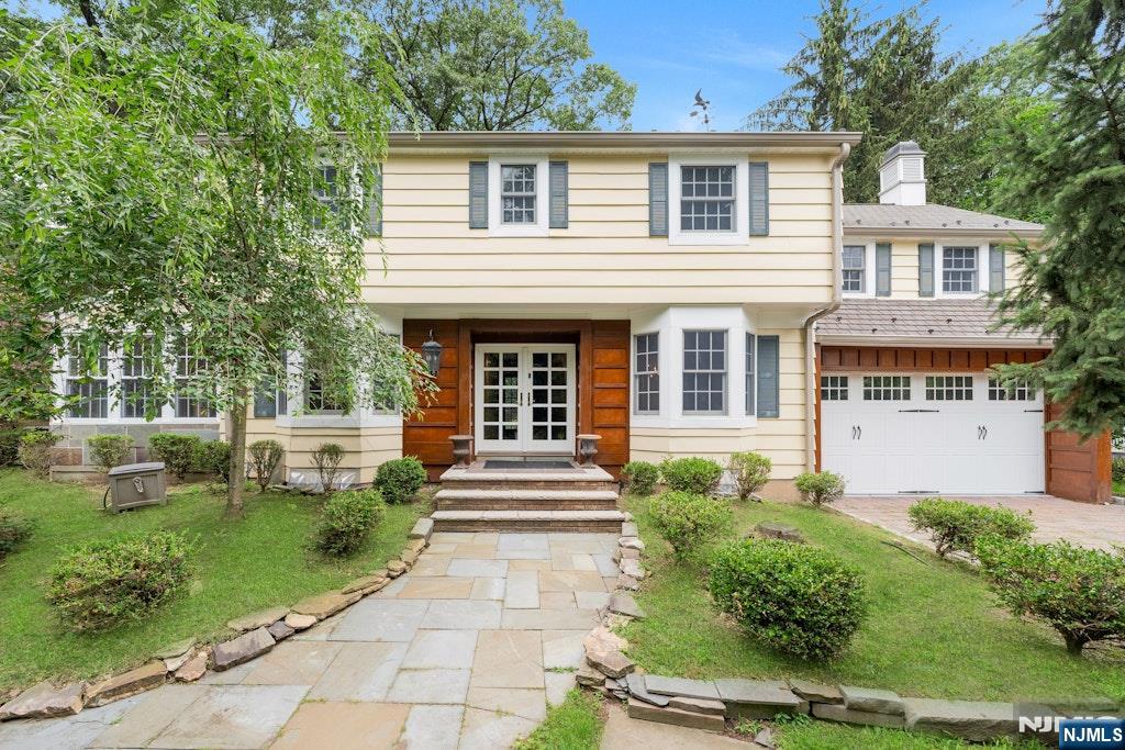 Discover the exceptional potential of this immaculate 3-bedroom, 1.5-bath center hall colonial, perfectly situated on a generous 170 x 150 lot with possible subdivision into two separate lots of approximately 85 x 150 eachâ€”an ideal opportunity for builders and investors. The beautifully maintained home can be comfortably rented out while subdivision and related applications are being processed, providing immediate income potential. Inside, the main floor offers a spacious layout highlighted by a formal living room with a stone fireplace, an enclosed porch featuring a second stone fireplace, a separate dining room, and a well-equipped kitchen. A convenient powder room completes this level. Upstairs, three inviting bedrooms create a peaceful retreat, all arranged around the traditional center hall that ensures a natural flow and distinct living spaces. SALE WILL NOT BE CONTINGENT ON SUBDIVISION APPROVAL Located in a highly sought-after town known for its excellent school system, this property is perfect for families as well as developers seeking long-term value. Enjoy the expansive backyardâ€”ideal for outdoor entertainingâ€”and additional features such as central air conditioning, a two-car garage, and a patio with built-in amenities. Donâ€™t miss this rare chance to own a pristine home with promising subdivision potential.