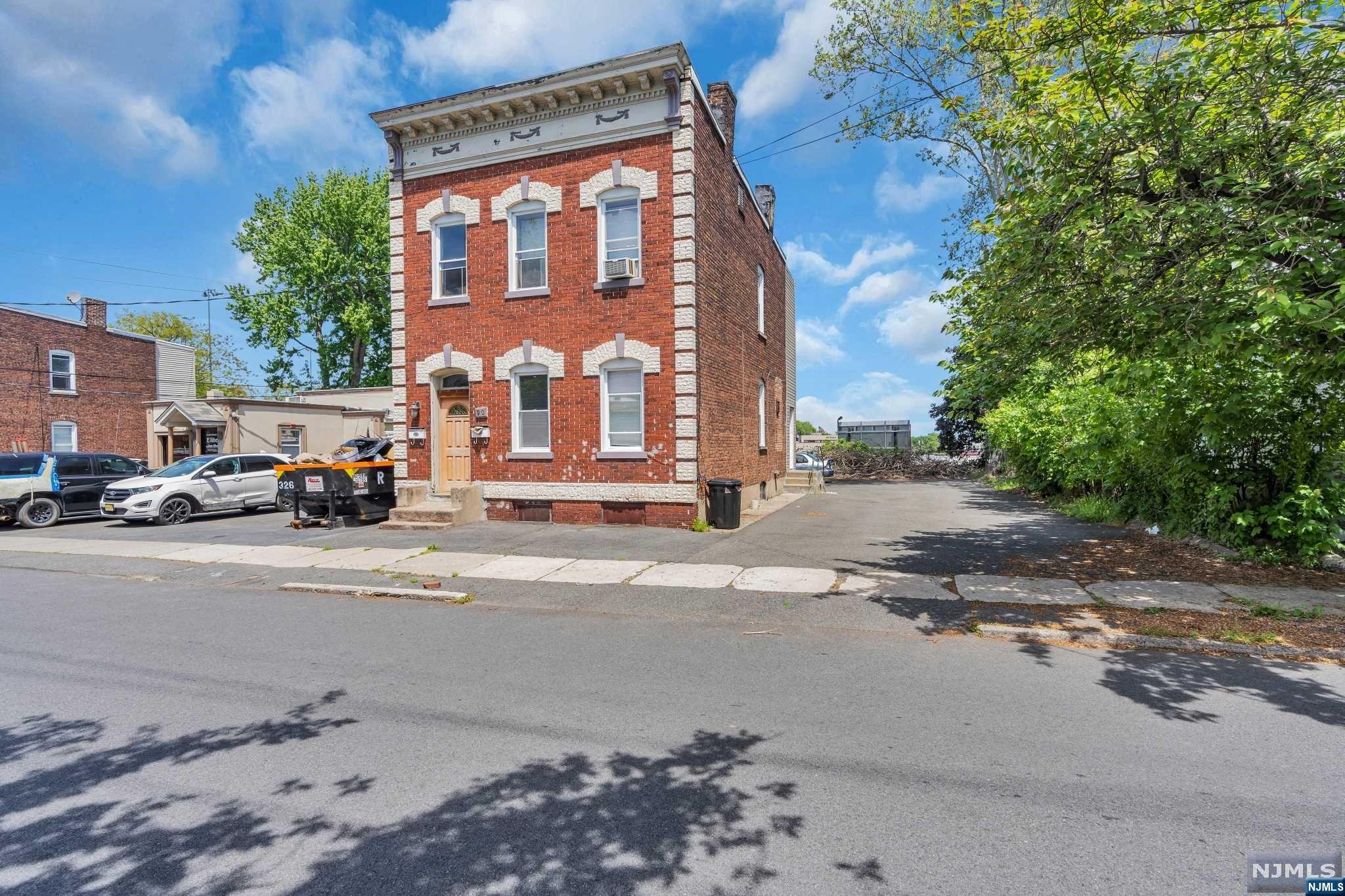 Welcome home to 90 E. Centre St. in beautiful Nutley Nj! This incredible brick two family home has updated kitchens, bathrooms & more! The 1st floor will be delivered vacant and and ready to move in after June 15 featuring 1 nice sized bedrooms a big kitchen with lots of counter space and 1.5 bathrooms including basement with endless potential. 2nd floor unit features 2 bedroom and 1 full bathroom and is currently rented for $1550 with lease ending 7/31/23. Huge parking lot for up to 10 cars! Live in one rent out the other! 1st floor unit will be delivered vacant and 2nd floor will be delivered occupied. This is a must see for any owner looking for additional income. Conveniently located close too many parks and shopping areas, schools, NYC trains & buses. Come and make this your dream home today!