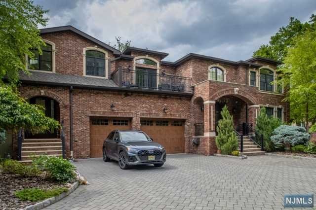 Welcome to #TheDayEstate! One of a kind property blends privacy, convenience and luxury. Located on roughly .83 acres in the heart of Ridgefield, you will not find another property like this. Side by Side brick duplex built sparing no expense. Blue Star eight burner griddle range with two ovens, sub zero refrigerator and freezer, custom concrete countertops are just a few of the highlights of this magnificent chef's kitchen. Master Bath has marble floors with radient heat. Built in Home Audio systems. Spacious Master Bedrooms with ample sized walk in closets.