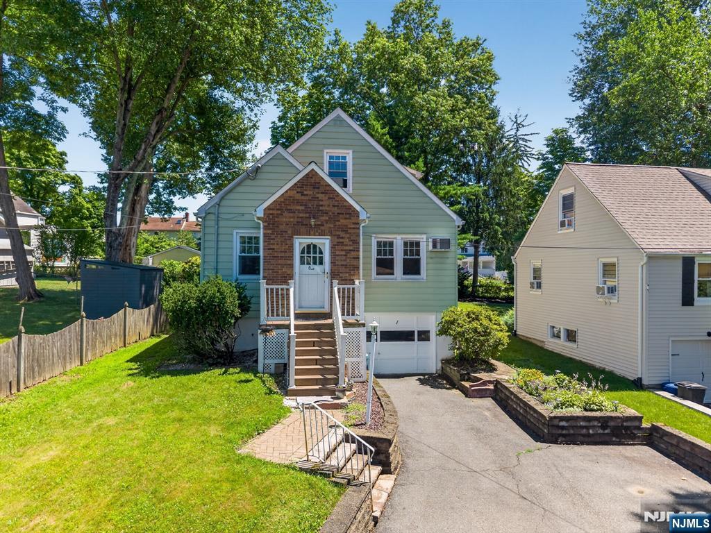 Located in Roseland, this 4-bedroom, 1.5-bath single-family home offers 1,311 square feet of living space. Built in 1936, the property features classic architecture with a practical layout and well-proportioned rooms throughout. Situated in an established neighborhood, the home provides convenient access to local amenities, schools, shopping, and major transportation routes.