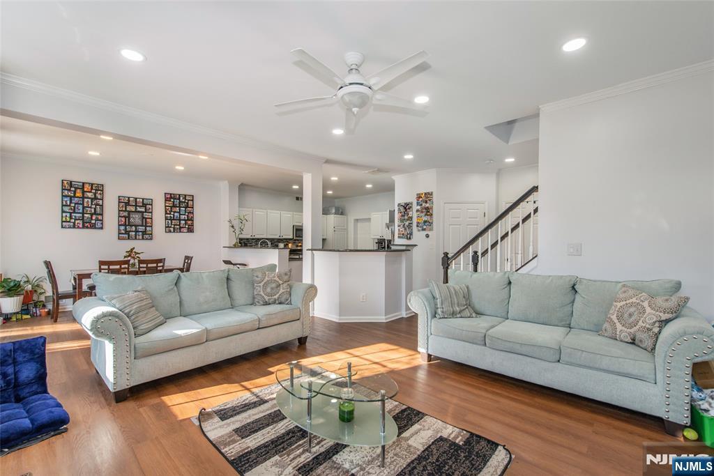 Gorgeous multi-level townhome in Cambridge Crossings. Sussex model - the largest floor plan offered! Ground level entry, open floor plan, walk-out to patio, luxurious master suite, multiple walk-in closets, granite kitchen, fireplace, and much more! This gated community features a pool, clubhouse, exercise room and saunas. Clifton Train Station and NYC bus are less than a mile away!