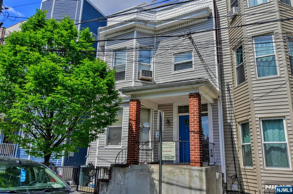 Your opportunity to own a two-family home in desirable Weehawken NJ offering flexible living and investment potential. The first unit spans the first floor and finished basement, featuring 2 bedrooms, 2 full baths, 2 kitchens, living room, and dining roomâ€”ideal for extended living or additional income possibilities. The second-floor unit offers 2 bedrooms, full bath, living room, dining room, kitchen, and a bonus outdoor-access room perfect as a third bedroom or private office. Home is equipped with Solar Panels. Both units share a laundry room. Can be delivered vacant with immediate possession. Space and location- not to be missed.