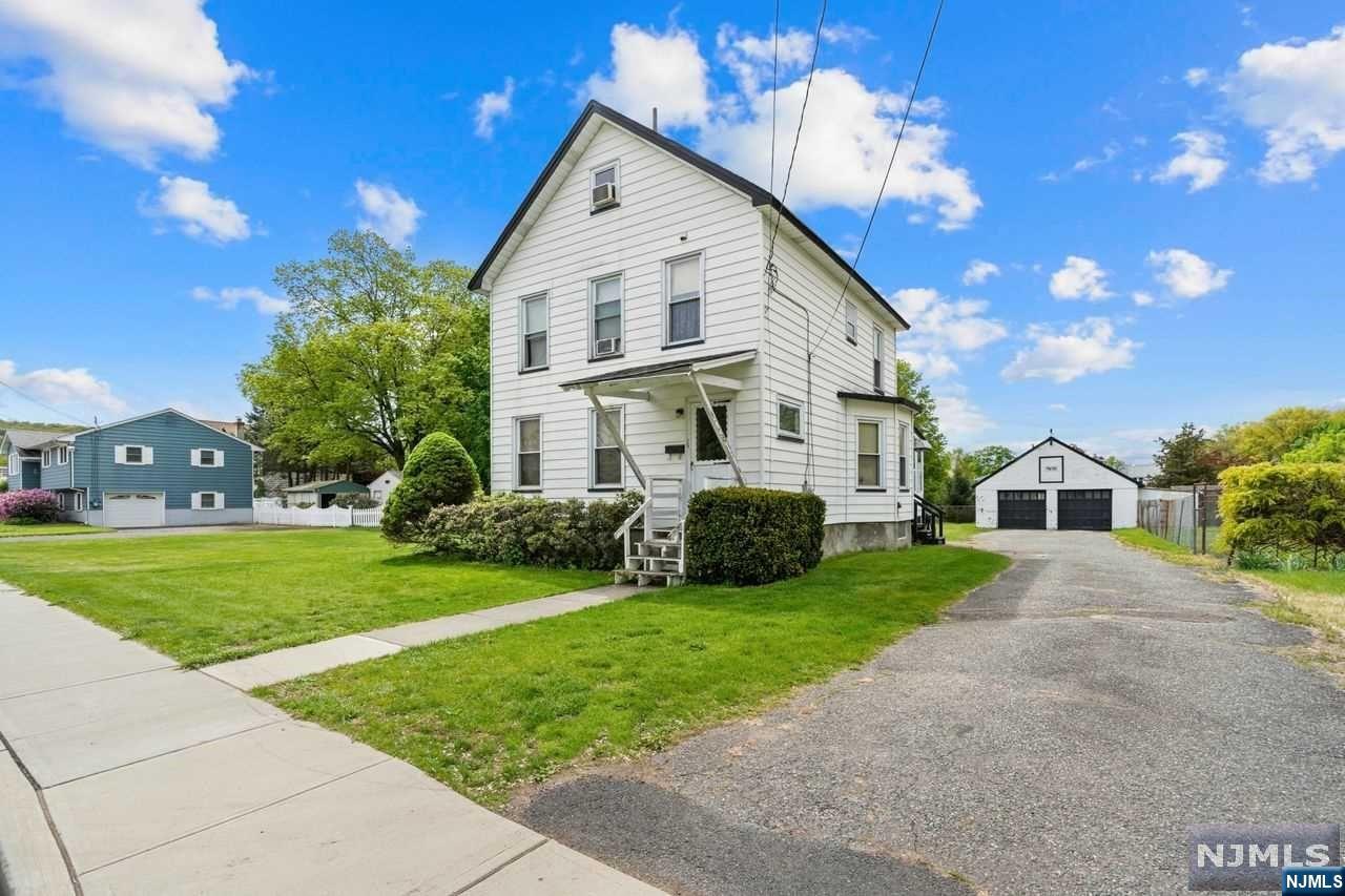RARE 3.2 acres of land with large 1898 colonial home and detached two car garage! Home features all large rooms on first level plus bonus large three season rear porch. Three ample sized bedrooms and a full bath on second level. Third level has partially finished room. Basement storage and bonus room. Bring your imagination and a little TLC and transform this home into your dream home dripping with old world charm! Radiators with covers. Updates include: furnace is 3 years old, updated electric 5 years, HWH 1 year old & roof is 5 years old. Public water and sewer, natural gas heat. Check out the drone shots to see how much property there is & how it is laid out. (tax record for lot outline is not accurate and being addressed with the tax office) Close to Rts. 287, 208, NYC Bus on corner, NYC express bus not far, restaurants, stores, hiking and boating also nearby.