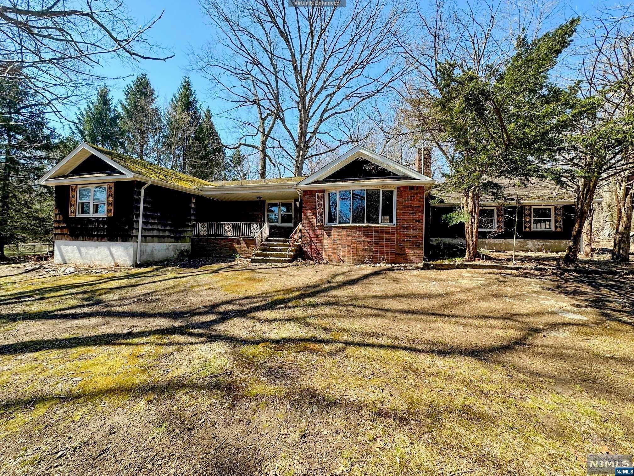 Welcome to this ranch style home that features a living room, kitchen, dining room, 3 bedrooms, one of which is the MBR with MBTH, a laundry room, a full bath, and an attached 2 car garage. This oasis has a pond view in front of the home and an inground pool in the back. Home is in need of some repair, which is an opportunity for you to make it your own. To help visualize this home's floor plan and to highlight its potential, virtual furnishings may have been added to the photos found in this listing. The property is being sold 'as-is'. The buyer is responsible for obtaining the CCO, smoke cert. and/or all inspections required to close. The buyer is also responsible for the well water test.