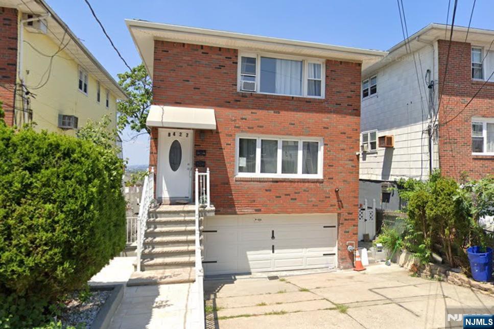 Welcome to 8427 Columbia Ave, a beautifully renovated income producing 2-Family. House has six bedrooms, three full bathrooms plus a walkout bonus unit on ground floor. Both units feature separate utilities with central AC, hardwood floor, and a garage/driveway for four car parking. House can be delivered vacant. Steps to NYC transportation. Close to restaurants, transportation, supermarkets, retail, shops, cafes, banks, library, schools, houses of worship, plus close to Edgewater, Hoboken, and NYC.