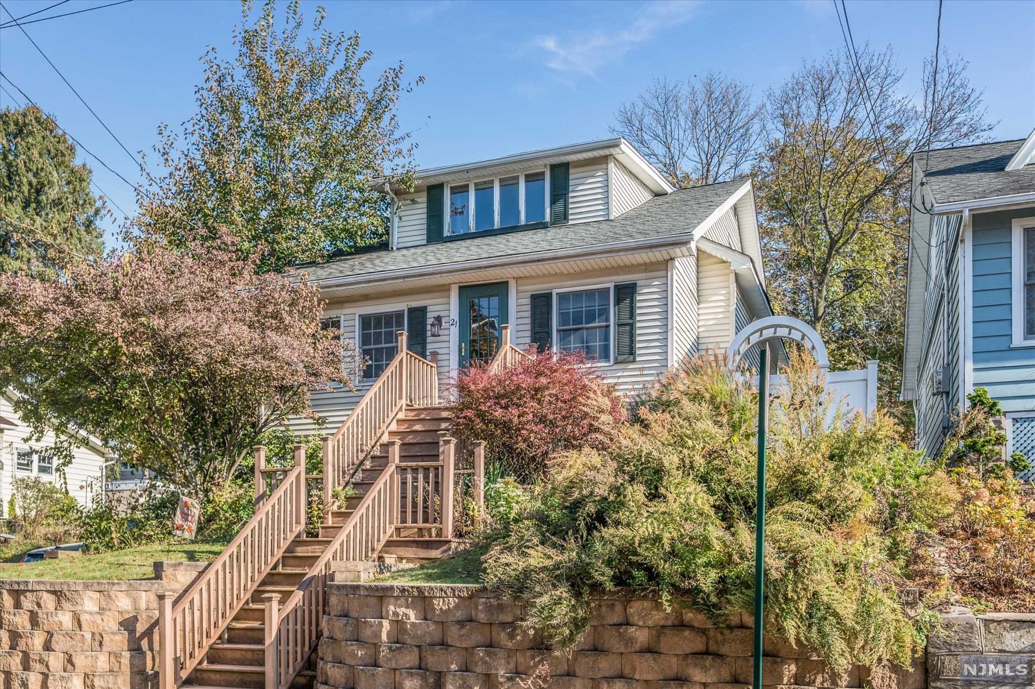 LOCATION LOCATION LOCATION!Feast your eyes on this oversized 3 BR cape with plenty of bonus space in the heart of Laning. Large first fl entry hall also serves as WFH space, LR, Chef's updated kitchen w/sliders to large sunny deck, primary en suite and a bonus den/office /nursery! Level 2 has 2 BR and full bath. Finished basement powder rm,rec room,laundry and walkout on lower level. Private yard! Central air and hardwood floors ! Make Verona Home for the Holidays! Close to school restaurants Verona park and NYC bus!