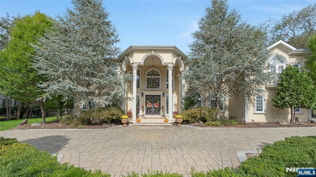 This 2010â€™s built grand manor on a prime lot in East Hill section of town, offers over 7600 sqft. on the 1st & 2nd floor plus an enormous finished lower level. This unique European styled residence includes a home theater, wine cellar w/tasting area, fully woodworked office/library, plus additional office areas if needed with great views of the property, inground pool, huge patios, large pergola, outdoor kitchen, spa & stone waterfall, and unique tee pee. A circular driveway and additional parking, expansive 3-car garage and lush landscaping throughout the beautiful setting. A unique opportunity for a discerning buyer!