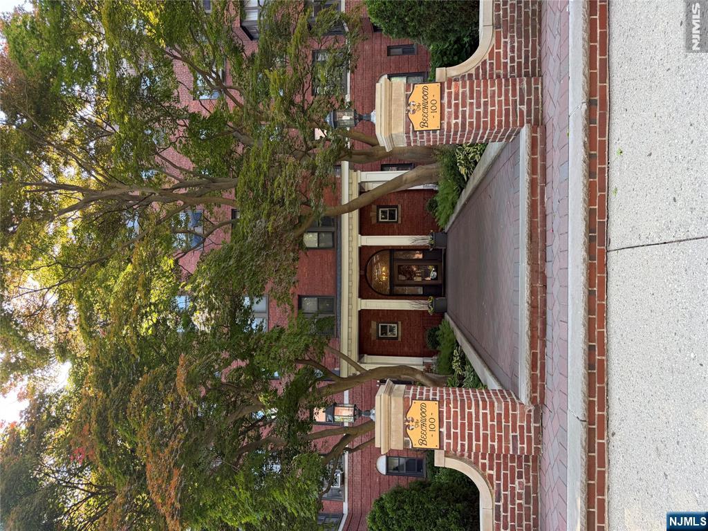 Experience bright, upscale living in this beautifully renovated two-bedroom residence located in one of Hackensackâ€™s most sought-after Prospect Avenue settings. Situated in Beechwood, a meticulously maintained historic building known for its elegant Art Deco lobby and beautifully landscaped grounds, this spacious apartment combines classic charm with modern updates just minutes from NYC. The sun-filled interior features soaring 9-foot ceilings, recessed lighting, gorgeous new flooring, oversized windows, and exceptional closet space throughout. A stunning windowed galley kitchen showcases granite countertops, abundant cabinetry, a pantry, and brand-new stainless steel appliances. The expansive living and dining area offers custom built-in shelving, creating a warm and inviting atmosphere ideal for everyday living and entertaining. Additional highlights include an updated windowed bath, welcoming foyer with multiple closets, and heat, water, and one parking space included in the rent. Residents enjoy convenient amenities including newly updated laundry facilities, recycling room, garbage disposal on every floor, and a live-in superintendent. Perfectly located near NYC transportation, schools, restaurants, parks, houses of worship, HUMC, and everything downtown Hackensack has to offer. Cats welcome.