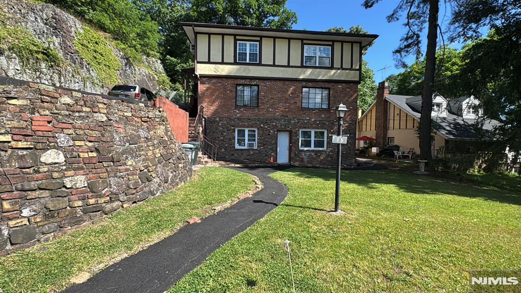 Beautifully updated first-floor apartment located on a quiet dead-end street in Hawthorne, NJ. Enjoy a peaceful neighborhood setting with fresh air and tranquility. This inviting unit features a spacious bedroom with ample closet space, a full bathroom with a tub, and a comfortable kitchen that opens to the dining and living areas, creating a desirable open-concept layout. The property also offers a beautifully maintained front yard and an assigned parking space directly in front of the home.Landlord covers heat, hot water, and cold water, providing added value and convenience. Conveniently located near shopping, restaurants, parks, schools, and major transportation routes. Don't miss this opportunity to enjoy comfortable living in a desirable Hawthorne location.
