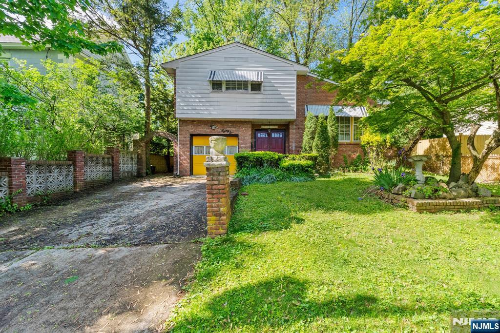 Nestled in a tranquil neighborhood, this charming split-level home at 86 Fairview Ave in Teaneck, NJ offers comfortable living with tremendous potential. Featuring three generously sized bedrooms and two and a half bathrooms, itâ€™s ideal for families or anyone seeking space and flexibility. Upon entry, youâ€™re welcomed by an expansive open-concept living and dining areaâ€”perfect for entertaining or relaxing with loved ones. The spacious eat-in kitchen and cozy family room with a built-in fireplace add to the homeâ€™s inviting charm. Beautiful hardwood floors run throughout, and the full finished basement includes two additional finished roomsâ€”ideal for a home office, gym, or guest space. While the home needs some updating, it presents a wonderful opportunity to renovate and make it your own. Sold strictly as-is, this property is ready for your vision. Donâ€™t miss outâ€”schedule your showing today!