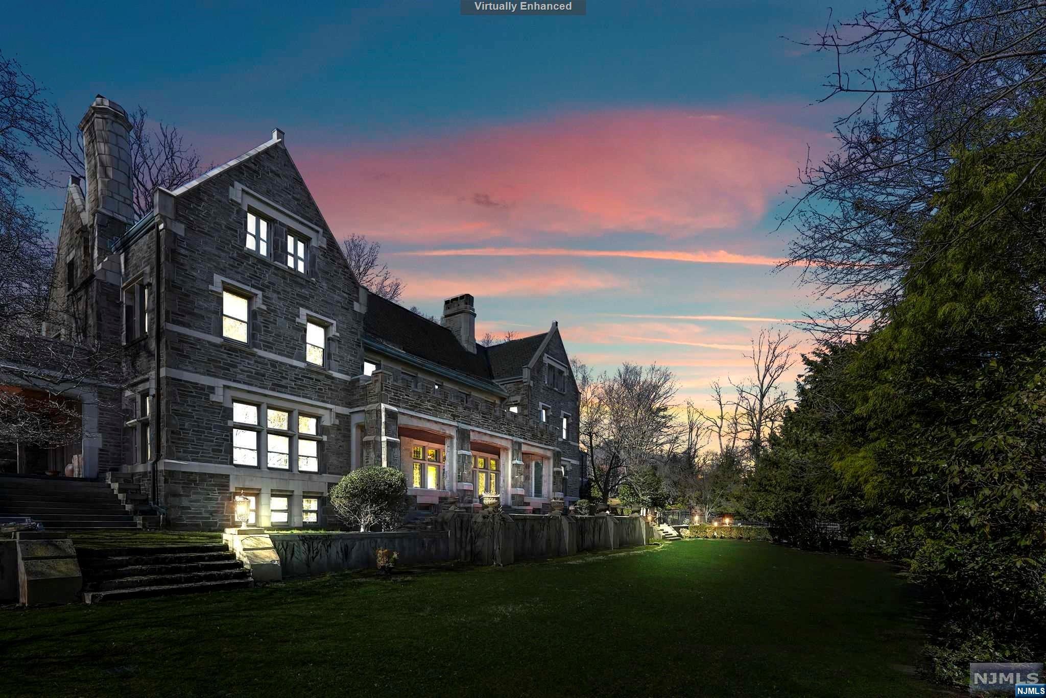 Indulge in the epitome of opulent living w/ "The Castle at the Crossroads," a masterpiece crafted by renowned architects Frank Wallis and William J Rogers, poised for a discerning owner to bring its restoration to completion. This majestic stone manor exudes luxury at every turn, boasting exquisite natural woodwork, mesmerizing leaded & stained glass windows, adorned w/stained glass medallions, & floors of unparalleled beauty. Step into a world of refined elegance w/formal rooms including a grand LR adorned w/a regal fpl, a DR fit for royalty, and an exquisite Library showcasing original built-ins & stately fpl. The large, meticulously updated Kit is a culinary delight, featuring stainless steel appliances, a spacious center island, and seating for 10, while the Butler's Pantry offers an abundance of bespoke cabinetry. Ascend to the upper levels to discover a sanctuary fit for the most astute homeowner. The Primary Bdr boasts breathtaking views of the iconic NYC skyline, a tranqui