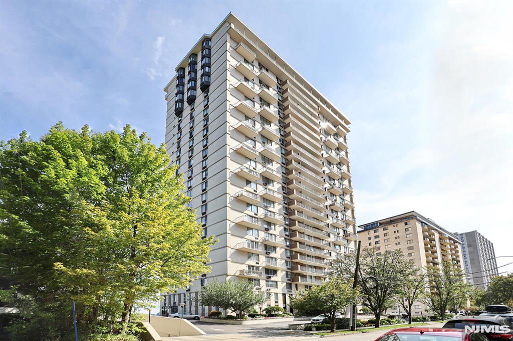 Welcome home to this beautifully renovated and spacious one-bedroom condo in the sought-after Devonshire, a luxury high-rise offering exceptional amenities and convenience. Featuring just under 1,000 square feet of open-concept living space, this bright and airy residence boasts beautiful parquet floors, abundant natural light, and a layout designed for comfortable everyday living and effortless entertaining. The updated kitchen showcases crisp white cabinetry and stainless steel appliances, opening seamlessly to a generous living room and full dining area. The oversized bedroom offers ample space for a complete furniture set along with excellent closet storage. A full bath and an oversized walk-in pantry/closet provide even more practical storage solutions. Enjoy the ease of all-inclusive living, with HOA fees covering heat, water, hot water, and electric. Outdoor parking is available for just $40 per month. The Devonshire offers resort-style amenities including a 24-hour concierge/doorman, on-site superintendent, fitness center, outdoor pool, laundry facilities on every floor, and a beautifully renovated lobby. Ideally located near Hackensack University Medical Center (HUMC), NYC bus and train transportation, shopping, restaurants, parks, schools, and major highways, this home combines luxury, value, and convenience in one exceptional package. No pets.