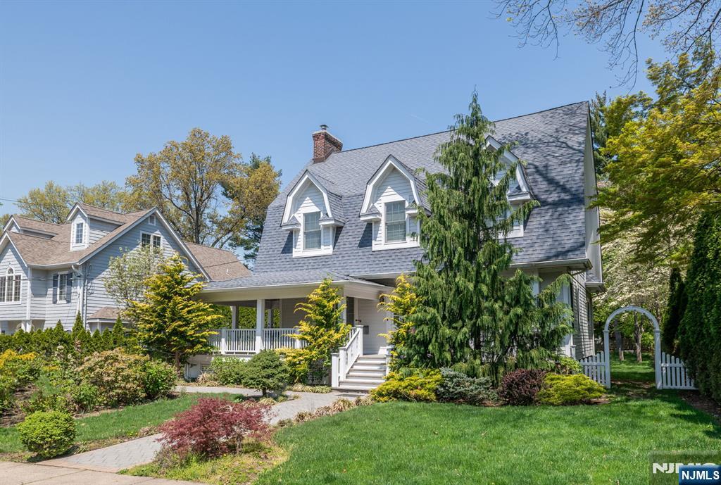 HISTORIC CHARM MEETS MODERN LUXURY: Meticulously renovated 1907 Colonial on prestigious Park Avenue (75 'x 200' lot). Approx. $500K in improvements showcase exquisite craftsmanship throughout this 4BR/3.5BA residence. Welcoming wrap-around porch leads to spacious interior featuring gleaming oak floors, custom windows, and refined finishes. Gourmet kitchen boasts a Wolf 6-burner range, a Sub-Zero refrigerator, custom cabinetry, and granite countertops. Complete gut renovation (2010) included new roof, electrical, plumbing, sheetrock, and custom staircase. 3-Zone HVAC ensures year-round comfortâ€”expansive 10,000 sq ft. A backyard with professional landscaping provides a perfect outdoor entertaining space. Finished bsmt offers additional bedroom, bath, and home office. The cobblestone driveway leads to a two-car garage with a patio above it. Prime Leonia between Broad and Grand Ave offers convenient access to transportation, shopping, parks, and highly-rated schools, only minutes to NYC.