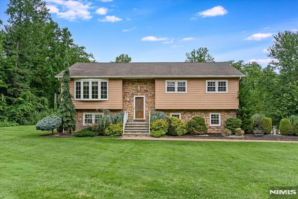 Welcome to this inviting bi-level home in the heart of Denville, one of Morris County's most desirable communities. Ideally situated just minutes from vibrant downtown Denville and the conveniences of Route 10, this home offers the perfect balance of neighborhood charm and commuter-friendly accessibility.Inside, you'll find a bright and functional layout with spacious living areas, generously sized bedrooms, and plenty of natural light. The flexible floor plan provides room for everyday living, entertaining, or creating a dedicated home office or recreation space. Large property for entertaining.Enjoy easy access to Denville's charming downtown, known for its locally owned shops, restaurants, cafes, and year-round community events. With major highways, shopping, parks, and recreation all nearby, this location makes daily errands and commuting a breeze while still offering the warmth and character of a welcoming suburban community.Whether you're looking for your first home, room to grow, or a convenient Morris County location, this well-located bi-level presents an exceptional opportunity to enjoy all that Denville has to offer. Deck is being conveyed in as is condition