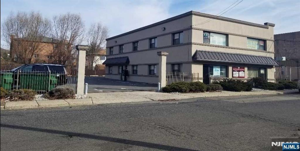Newly renovated building with a newly paved parking lot with plenty of parking space 20+. - Unit has been completely renovated. Excellent location - Less than Block from Grand Ave, major highway RT46, I80 & NJ Turnpike. Designated Bathroom, Central Air, Separate Utility Meter. Modified gross - all taxes & ins included.