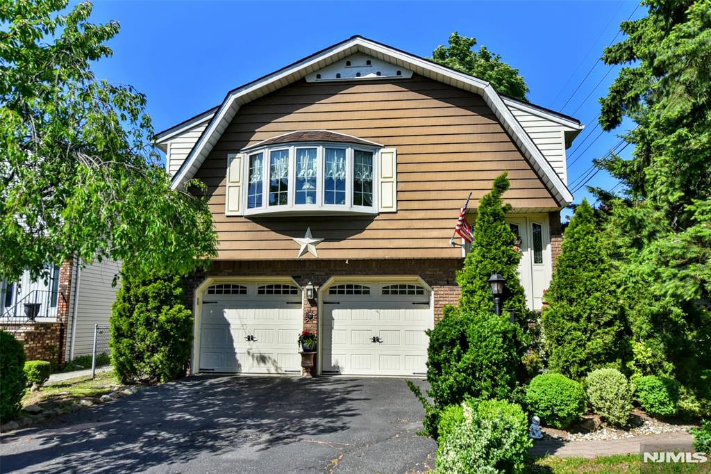 This spacious 4-bedroom, 2 full bath home offers incredible potential in one of Bergen County's most desirable communities. Featuring a flexible layout, generously sized bedrooms, an attached heated 2-car garage, and a fenced-in backyard approximately 2 years old, this home is perfect for everyday living, entertaining, pets, or outdoor enjoyment. Conveniently located less than 18 miles from New York City, Maywood is known for its top-rated schools, charming downtown, and strong community feel. Bring your vision and cosmetic updates to make this home your own while enjoying the space, location, and opportunity it has to offer.