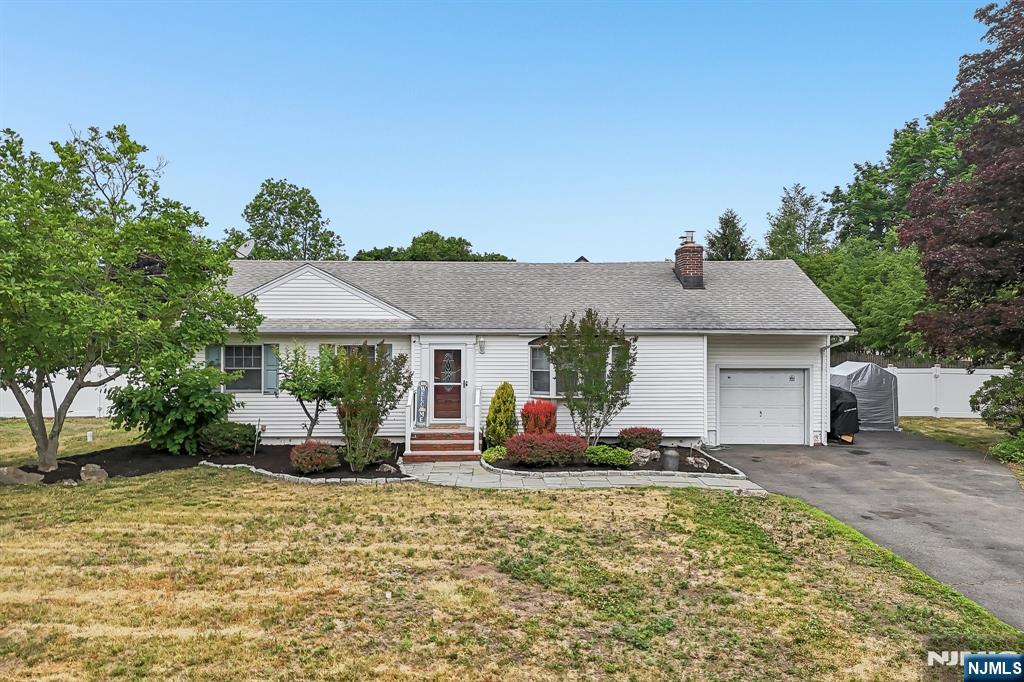 Amazing opportunity for Ranch-style living on one of the most desirable streets in Wayne- Welcome home! Features include: inviting formal living room with charming fireplace and wall of built in's, nicely sized dining room and expanded kitchen with granite countertops, snack peninsula, open concept to beautiful sun filled breakfast room addition: cathedral ceilings and wall of windows and natural light. With 3 bedrooms 2 full baths, this home is perfect for all life-style needs. Full finished basement for recreation and entertaining with full bathroom and storage. Additional attributes: recessed lighting, hardwood floors, 1 car garage, oversized patio and large level fenced in yard for all your outdoor enjoyment, plus a storage shed. Whether you're buying your first home, looking for expansion potential or downsizing, make sure you embrace the possibilities. Great location: top rated schools, steps to Wayne Hills High school, minutes to shopping, restaurants, Trader Joe's, Whole Foods, town library, NJ transit center, and major highways.