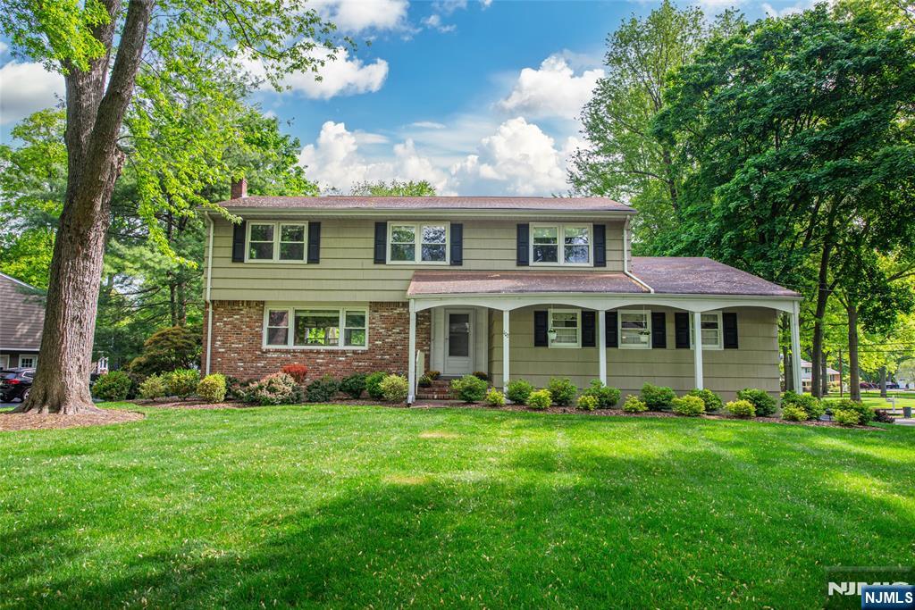 Located on a beautifully landscaped property spanning over half an acre in Wyckoffâ€™s highly sought-after Sicomac section, this inviting four bedroom, 2.5 bath colonial offers a wonderful opportunity for its next owner to make it their own while enjoying the great layout and wonderful indoor-outdoor living. A welcoming floor plan features over 2,200 square feet of sun filled living space between the first and second levels with hardwood floors throughout, spacious and open living spaces, a gas fireplace and thoughtful everyday conveniences including a mudroom/pantry and a first-floor laundry room. The property is designed for both relaxation and entertaining, highlighted by an expansive and oversized deck with a gas grill hookup which overlooks the flat and private backyard with extensive professional landscaping, sprinklers and a storage shed. Additional features include a full unfinished basement, two car garage, alarm system, generous closet space, and sewers. Located in the desirable town of Wyckoff close to shopping and NYC transportation, this special home combines comfort, functionality, and exceptional property appeal.