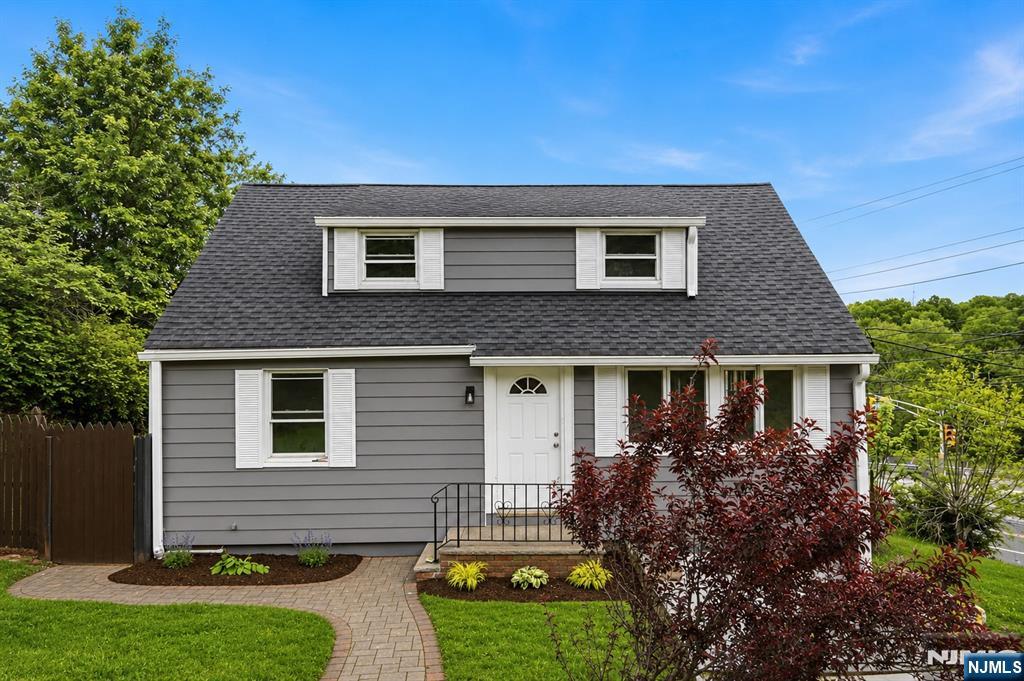 Nestled in the highly sought-after West Orange community, this beautifully renovated 3-bedroom, 1-bath home perfectly blends modern updates with timeless charm. From the moment you arrive, you'll appreciate the inviting curb appeal and picturesque golf course views that create a serene and private setting year-round. Step inside to discover a bright and airy layout featuring gleaming finishes and thoughtfully designed living spaces ideal for today's lifestyle.The stunning galley kitchen is a true standout, complete with sleek quartz countertops, contemporary cabinetry, stainless steel appliances, and a convenient breakfast bar perfect for casual dining or morning coffee. Entertain effortlessly in the formal dining room, offering the ideal space for hosting dinners and holiday gatherings. The living areas provide comfort and versatility, while all three bedrooms offer generous natural light. Downstairs, the finished basement adds valuable bonus living space that can be used as a recreation room, home office, gym, or media area. Step outside into the beautifully designed backyard oasis, set up for entertaining with plenty of room for outdoor dining, relaxing, and enjoying warm summer nights with friends. Conveniently located near shopping, dining, parks, major highways, and NYC transportation, this move-in-ready gem offers the perfect combination of comfort, style, and location. Don't miss the opportunity to make this exceptional West Orange home your own