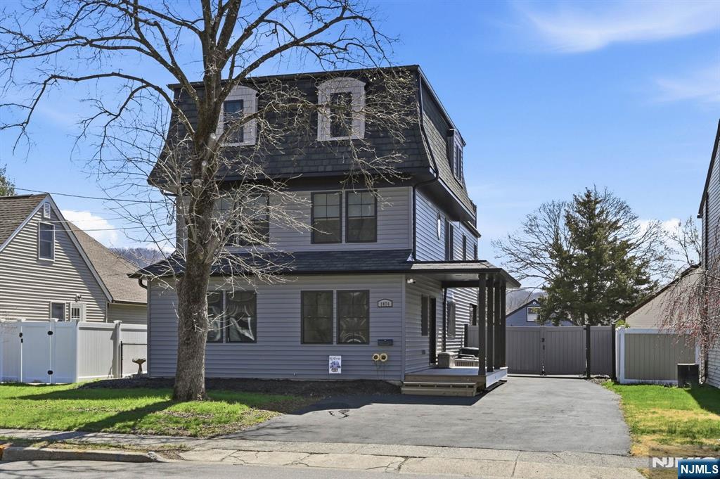 Builder's own 4BR/3.5BA lakefront showpiece is a true standout!Timeless character seamlessly blends with today's modern updates. Charming porch welcomes you into a home defined by warmth and craftsmanship.1st level has liv rm, sun-drenched ofc (or optional 5th BR),beautifully updated EIK w/island,ss appl and pantry that flows effortlessly into spacious fam rm w/frplc, and captivating lake views! Lovely FBA w/soaking tub completes 1st fl.Upstairs, a serene primary suite captures breathtaking lake views and has WIC,dressing area,and luxurious FBA w/oversized frameless glass shower,bidet and double vanity.3 more BRs and stylish FBA complete 2nd fl.The 3rd level has sprawling recreation space w/pool table, half bath,and access to a spectacular fiberglass traction rooftop deck-perfect for relaxing or hosting while enjoying panoramic views! Huge walk-in storage adds to the functionality.The unfin. bsmnt has lndry, workshop,util.and access to yard via mudroom.Outdoor living is impressive w/ingrnd htd pool,smokeless firepit for year-round enjoyment,and direct lake access for boating and fishing. A 2-car gar w/elec and loft space and an expansive driveway accommodating 6+ vehicles adds convenience and versatility.Addtl upgrades incl CA,updated elec and mech sys.Ideally located near schools,parks,houses of worship and minutes from downtown shopping and dining, this exceptional property offers a perfect blend of lifestyle, location and luxury.More than a home,it's a year-round retreat!