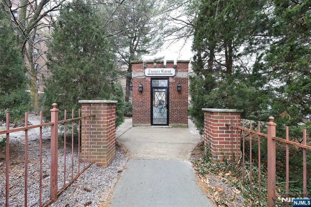 Luxury living meets unmatched value in the East Hill section of Englewood at the iconic Dwight Manor. This spacious 2-bedroom, 1-bath first-floor condo with garage offers the comfort and scale of a home in a secure, historic building set within a beautifully landscaped park-like setting. Bonus wood burning fireplace! Perfectly located just minutes to NYC, downtown Englewood shopping, dining, Bergen PAC, library, parks, Englewood Hospital, houses of worship, and top fitness studios. NYC and local buses right outside make commuting effortless. Enjoy classic architecture, generous room sizes, and the prestige of one of Englewoodâ€™s most desirable buildingsâ€”a true luxury alternative to Manhattan living at a fraction of the cost. Cats OK. Elevator building. Laundry & gym on site with a Super.