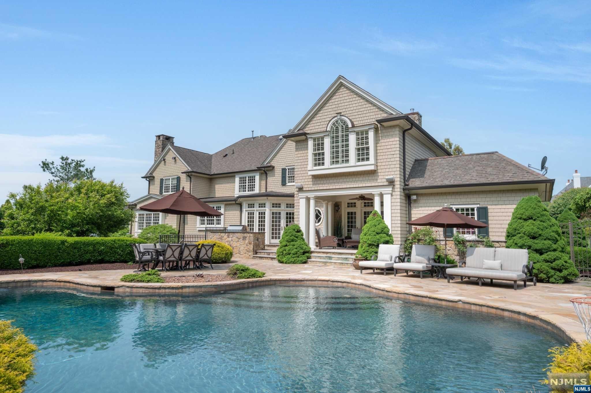 Beautiful, Bel Air classic colonial redone by renowned architect John James in 2006. 6bds, 4.2bths almost 7000 ft. of pure luxury. Grand 2 story foyer, herringbone, hd/wd fl rs, custom moldings, wood trim & coffered ceilings. European style center island, ktchn, granite countertops, travertine fl rs, wolf range, top-of-the-line applncs. Butler's pantry leads into extra large dining rm. Oversize family room w/ built-ins book cases surround luxurious fi replace. Wet bar off the living room for privte entertaining. Home office with fi re place. custom built ins & French doors lead out to cozy covered porch. Magnificent bilevel backyard oasis. Walk out from kitchen to Freeform salt water pool and spa, private landscaping. Sports/basketball/pickle ball court walkout lower level, arts and crafts room, xtra bedroom and full bth. Large game room, room for future home theater. Master suite w/ vaulted ceilings, private sitting area and fi replace. 2 large, walk-in closets.