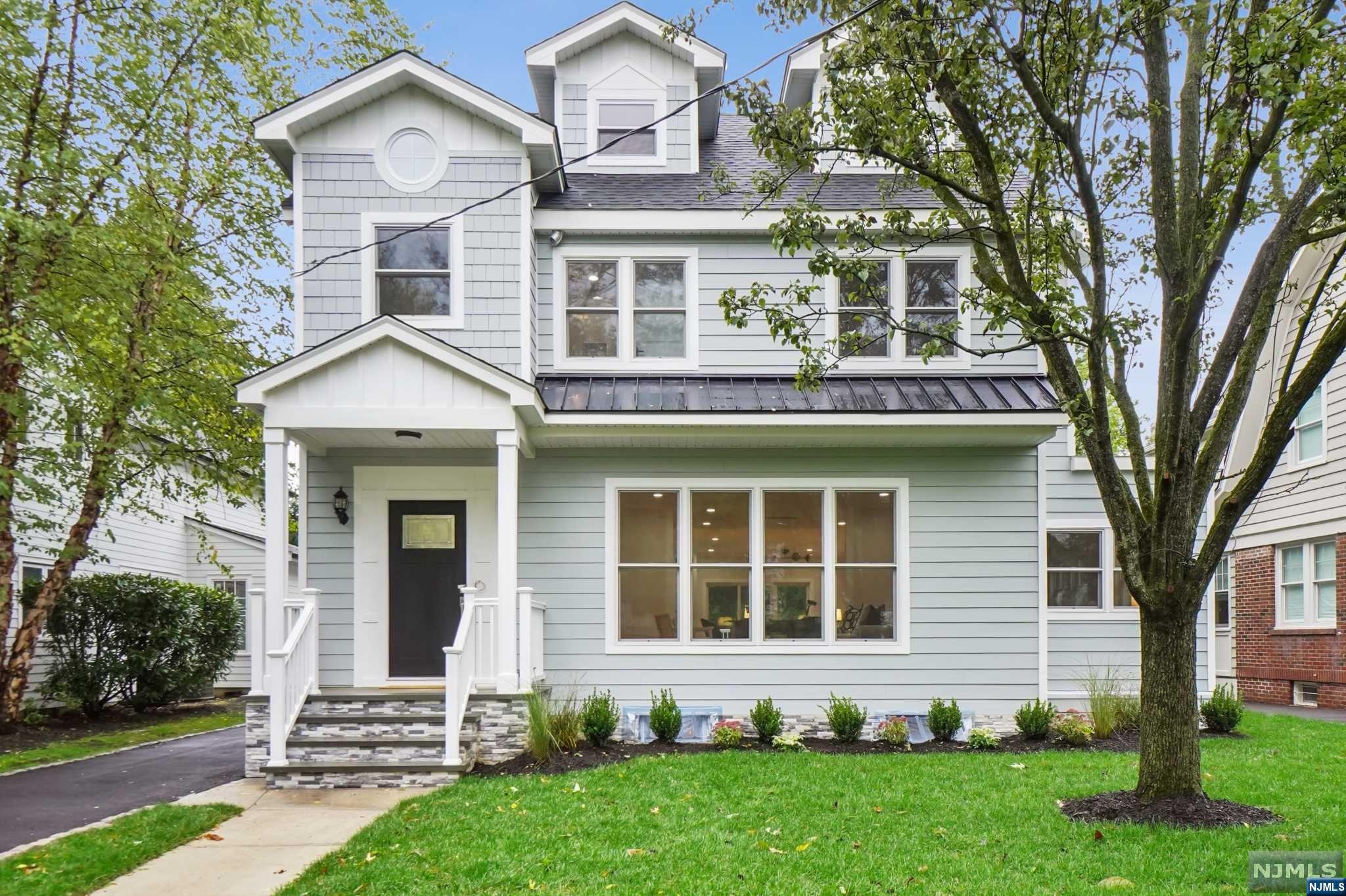 This luxury newly rebuilt home is over 4000 sqft, located in the desirable South Maintain neighborhood. Anderson Windows, Hardie Plank Siding, white oak floor with Natural finishing throughout! Five bedrooms, Five full baths with 4 finished level of living space w/ soaring 9 ft ceilings in family rm & kitchen area. Gourmet eat-in chefs kitchen with Vicking appliances, waterfall quartz countertops, opening to the family rm w/ sliders to the patio and private back yard. 1st level has bright & sunny office also can be used as a br, full bath, formal dining rm, living rm. 2nd level has primary Suite on with walk-in closet, ensuite bath with luxurious soaking tub & separate stall shower, princess suite with full bath, two additional generously sized brs with spacious closets & another full BA with double sinks. The third level offers another full floor of living space with an additional br, full bath & office area. Walking distance to park,downtown, midtown direct train line & schools.
