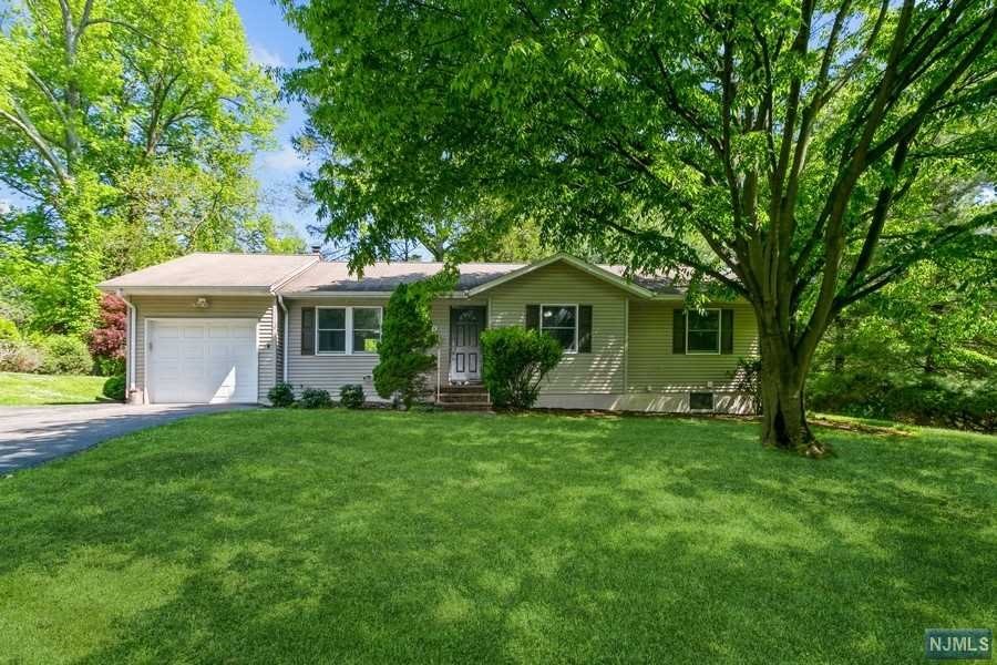 Totally updated ranch home on a quiet street in Closter, close to shopping, NYC transportation, schools and places of worship. Welcoming with gleaming hardwood floors and an open floor plan, this home offers a renovated kitchen and renovated bathrooms and a just completed large, full finished basement with half bath and rec area. Large deck overlooks beautiful, manicured yard. Tons of potential to expand.