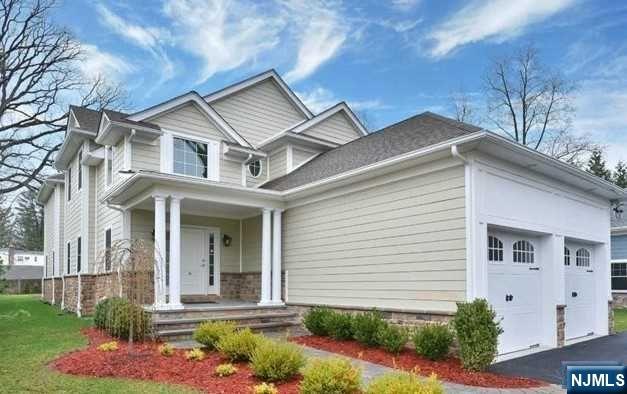 Built in 2016, this 6 bedroom 4 full bathroom Hardie plank and stone Colonial home at approx. 6000 sqf on an extra deep lot with room for a pool is just what you have been looking for!Two story entry foyer and 9 foot ceilings on both the first floor and basement with extensive trim , beautiful hardwood floors. First floor offers living room, butlers pantry with wine cooler, dining room and bedroom/office perfect for today's living Magnificent open kitchen with center quartz island, JennAir appliances double oven, two sinks and two dishwashers. Family room with gas fireplace has sliding glass doors which open to the deep backyard and stone patio. Second floor offers master bedroom suite with 2 walk in closets and master bath with soaking tub and walk in shower. Three additional bedrooms full bath and laundry complete the second floor. Full finished basement has great space for playroom, media room or gym plus a bedroom and full bathroom.