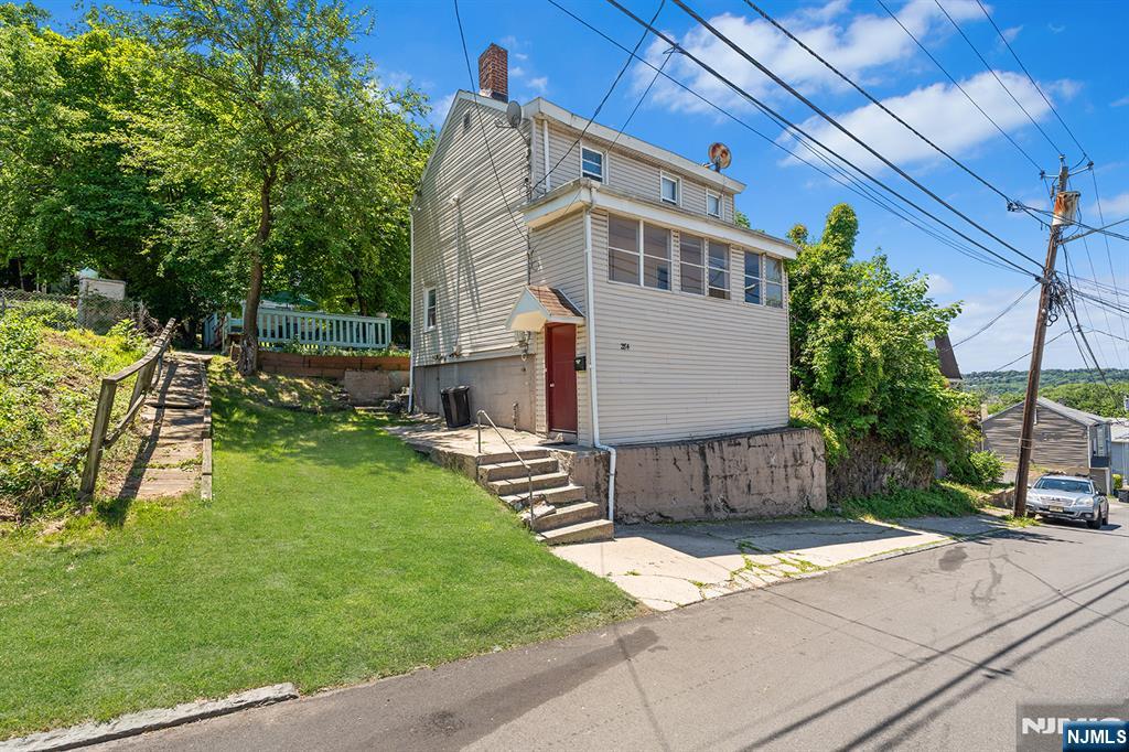 Donâ€™t miss this opportunity! Set in one of Patersonâ€™s most desirable residential neighborhoods, this property offers a rare combination of space, convenience, and opportunity. The oversized lot provides exceptional flexibility for outdoor enjoyment today while offering future possibilities for those looking to maximize the propertyâ€™s potential. Live and entertain with ease as the home offers: an open-concept living and dining area, an oversized kitchen with ample space for gathering, generous outdoor deck space, off-street parking, and a layout designed for comfortable everyday living. Whether youâ€™re looking for a place to call home or exploring long-term possibilities, this property delivers value in multiple ways. Located close to schools, parks, shopping, transportation, and major highways, the setting and oversized property make this a unique opportunity. Schedule your private tour today.