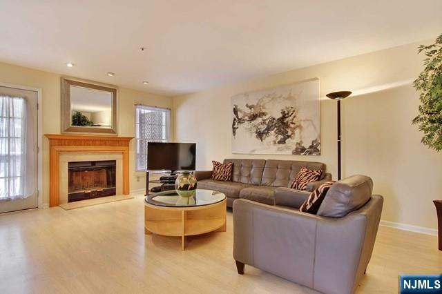 THIS DESIRABLE END UNIT IS WELL LOCATED ON A DEAD-END STREET IN THE MUCH SOUGHT AFTER CAMBRIDGE HEIGHTS GATED TOWNHOUSES. SPACIOUS FLOOR PLAN OFFERS MODERN EAT-IN KITCHEN WITH BEAUTIFUL BAY WINDOW, AFFORDING PLENTY OF SUNLIGHT. THE FOCAL POINT OF THE LIVING ROOM IS A BEAUTIFUL WOOD-BURNING FIREPLACE. ALSO ON MAIN LEVEL IS MASTER BEDROOM WITH ENSUITE BATH, A SECOND BEDROOM, FULL BATHROOM AND LAUNDRY. INCREDIBLE SPACE ON THE LOWER LEVEL CAN BE USED AS OFFICE, DEN, GUEST BEDROOM OR PLAYROOM. LOWER LEVEL ALSO INCLUDES A FULL BATH.ONE CAR GARAGE WITH OPENER, PRIVATE DRIVEWAY. CONVENIENTLY CLOSE TO ALL, INCLUDING EXCELLENT TRANSPORTATION TO NYC, BUS STOP AT ENTRANCE AND TOP RATED SCHOOLS. No Smoking, Credit Check, Income verification, renters insurance and interview required. Tenant responsible for first $150 of repairs