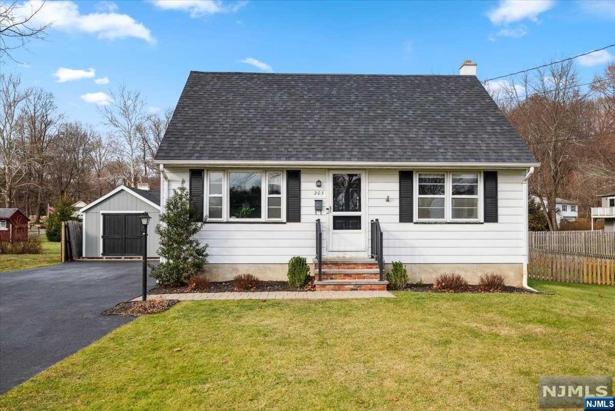 Lovely Expanded Cape in an Unbeatable Location set on a meticulously maintained 1/4-acre lot just minutes to shopping, dining in downtown Hackettstown, as well as Estate Park, Hospital & Direct Train to NYC. With 3B/1.5bth, enclosed porch & a partially finished basement, there's room for everyone! The main level that starts w/a cozy living room w/crown molding & lots of natural light. Just beyond is a spacious renovated Eat-In kitchen w/classic white cabinetry, quartz counter tops, farmhouse sink, SS appliances. Sliding glass doors take you to an enclosed porch & a flat fully fenced-in backyard w/plenty of space for cookouts, relaxing, games & gardening. Past a full hall bath you'll find a large family room perfect for movie nights & entertaining. Completing the main floor is a spacious primary bedroom. Upstairs 2 additional bedrooms, each w/a WIC, and a powder room is in the hall. There's more living space in thefinished lower level, w/a rec-room, laundry, utilities & storage.