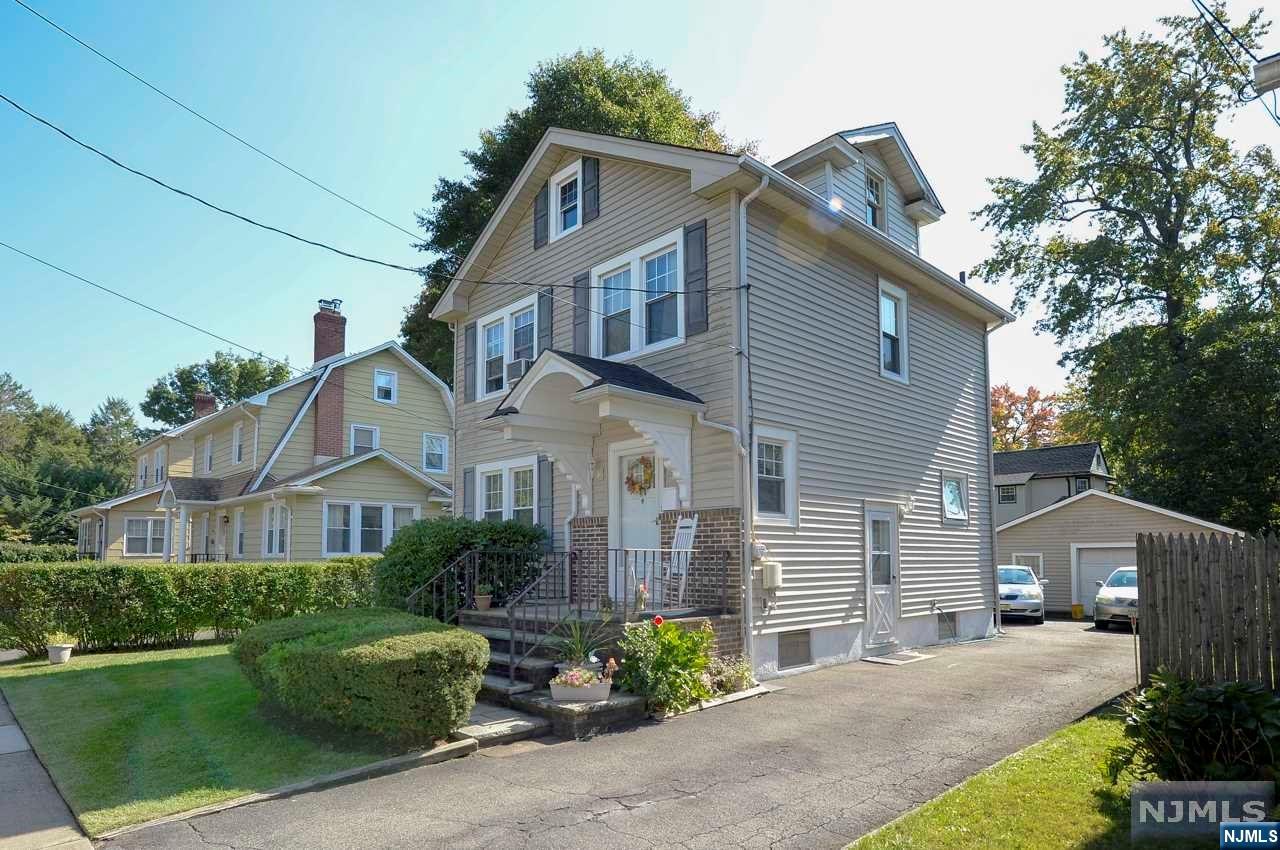 Lovingly maintained colonial situated on quiet street! Super clean and in move in condition! This home features a large living room with fireplace. Huge formal dining room ideal for entertaining! Spacious eat in kitchen. Good sized primary bedroom and two more nicely sized bedrooms with large closets. Full bathroom. Very convenient walk up attic with loads of storage space! Full partially finished knotty pine basement with cedar closet and laundry. Hardwood floors. Wonderful private rear yard with patio! Oversized garage with workbench and plenty of storage space. Oversized driveway. Truly a must see to appreciate!!