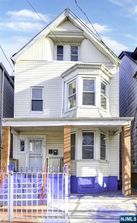 Welcome to this 2-family home, brimming with potential to make it your own. The first-floor unit offers a comfortable living space with a living room, kitchen, two bedrooms, and a full bath. The second and third levels are combined to form a spacious unit featuring a living room, kitchen, three bedrooms, and a full bath. To help visualize this home's floor plan and to highlight its potential, photos are virtually enhanced and/or virtual furnishings may have been added to the photos found in this listing. There are no seller disclosures nor representations. The buyer is responsible for obtaining the CCC/CCO, and smoke cert. and/or all inspections required to close. The property will not pass traditional financing in its current state. Cash Offers or Alternative Financing Only.