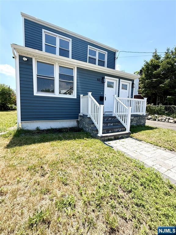 This fully renovated two-family home features modern upgrades, premium finishes, and distinct layouts. Designed for either versatile living or immediate rental income.This property features fully upgraded units with open-concept living, separate private entrances, private driveway and large backyard for entertaining. Both units have been completely gutted and reimagined, boasting brand-new electrical, plumbing, roof, siding, and appliances. Ideal for living in one unit and renting the other, or as a seamless, cash-flowing addition to your portfolio. Separate utilities and a prime location make this a must-see. Property is vacant and easy to show immediately. Seller will provide a 10k seller's concessions to buyer. Text listing agent for confirmed appointment. Security cameras included. Adjacent lot not included in the sale.