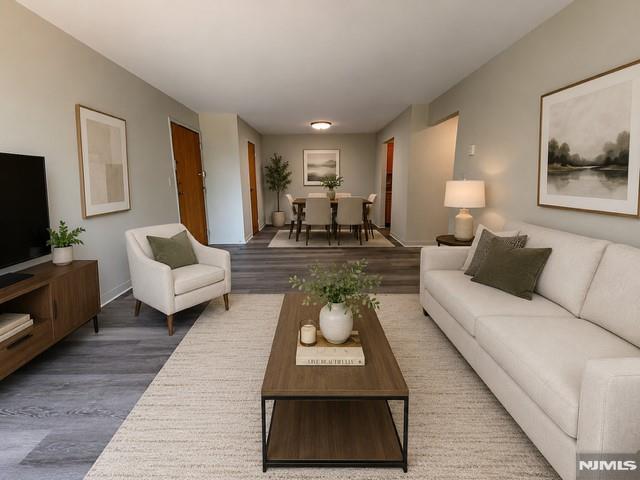 Move right into this beautifully updated 1-bedroom condo in desirable Ledgewood Terrace, offering low-maintenance living in the heart of Little Ferry, NJ. Perfect for first-time homebuyers, downsizers, or NYC commuters, this spacious unit features brand-new hardwood flooring, a large sun-filled living room with access to a private balcony, a separate dining area ideal for entertaining, and an oversized bedroom with a generous closet. The updated kitchen includes a brand-new stove, while the renovated bathroom features a tiled walk-in shower with a built-in bench. Residents enjoy beautifully maintained grounds, a community pool, and convenient on-site laundry facilities. Low monthly maintenance includes water. Ideally located near shopping, restaurants, parks, major highways, and public transportation to NYC, this condo offers an exceptional opportunity to own in Bergen County at an affordable price. Enjoy easy access to Route 46, Route 80, the NJ Turnpike, and nearby bus service to Manhattan. Why rent when you can own? Schedule your private showing today and discover all that Little Ferry has to offer!