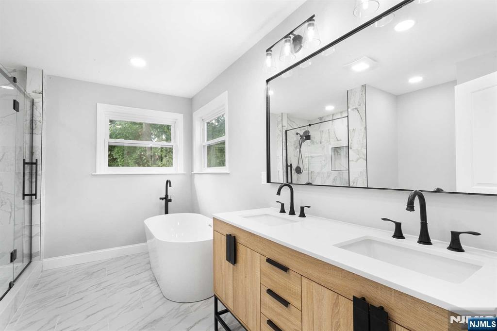 Welcome to this beautiful Custom Home on a cul-de-sac in desirable Brookdale section of Bloomfield, this home is fully renovated. Finished basement. Gourmet style kitchen with stainless steel appliances. As you enter you'll find a two story ceiling leading to a loft. Spa-like primary bathroom with soaking tub, large shower and double sink, walk in closet. Walking distance to shops, restaurants, park. A must see!The finished basement adds for additional living space, it could be used as a media room, play room, or gym, and comes with a full bathroom. House is NOT in a flood zone.