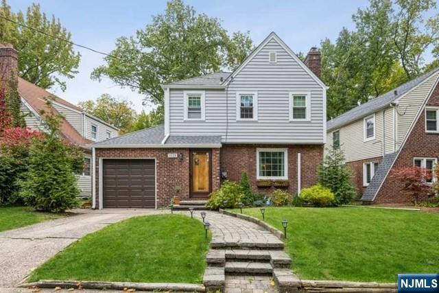 Charming and beautifully updated Colonial. This well-kept home features a detached one-car garage, hardwood floors, fireplace, and generous living spaces â€” offering both comfort and modern upgrades. The main level includes a sunlit living room with fireplace, a formal dining area, an eat-in kitchen, and a coveted three-season room with floor-to-ceiling windows. Upstairs, youâ€™ll find three bedrooms with ample closet space and a full bath. The finished basement includes a rec room, powder room, and laundry area. Step outside to a newly built deck and large fenced-in yard â€” perfect for relaxing or entertaining. Recent updates include a new roof, windows, siding, gutters, A/C and heating systems, and carpets. Close to major highways, houses of worship, and more â€” this is a must-see gem!