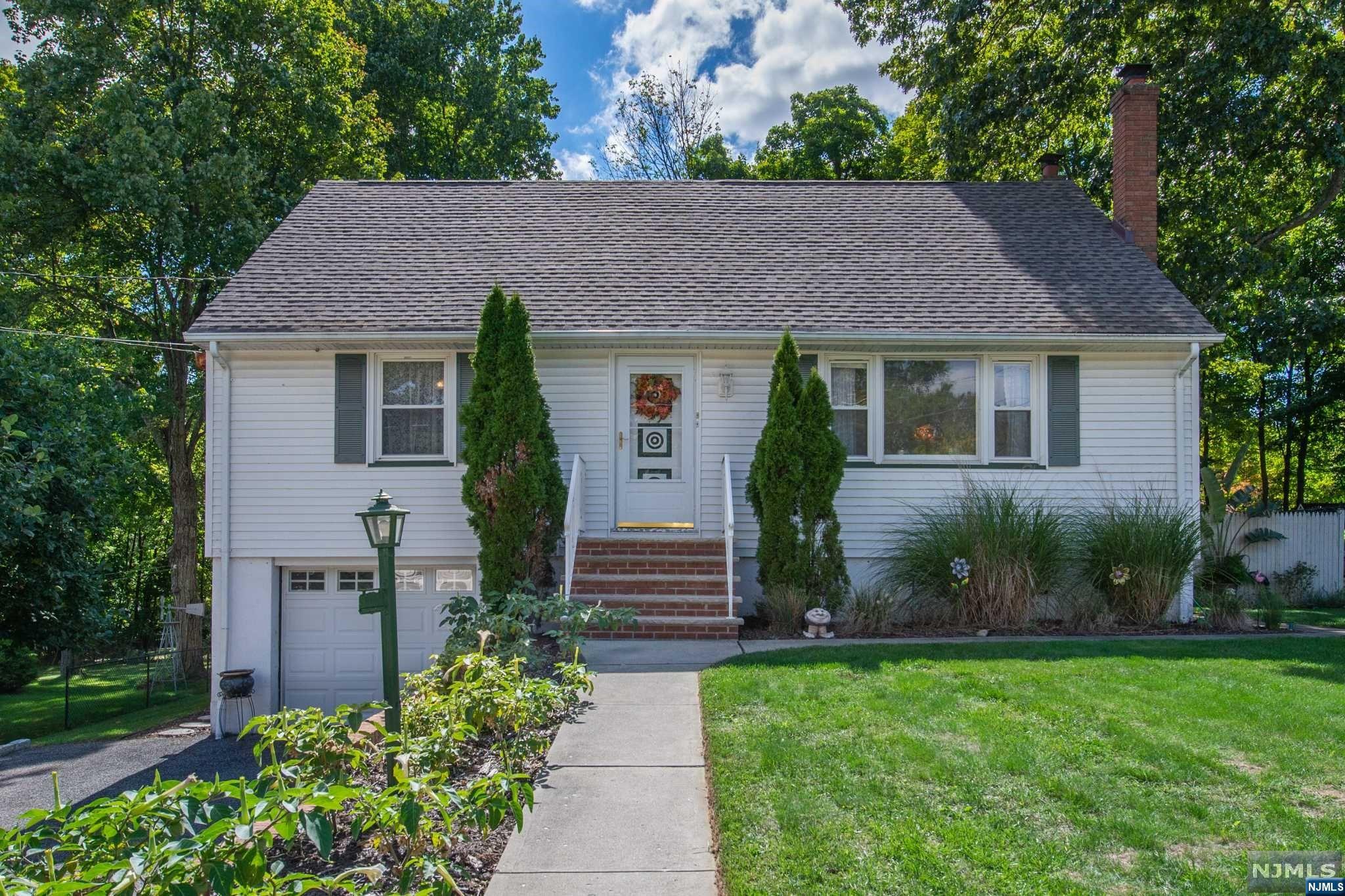 Welcome to this spacious expanded cape cod style home located on a cul de sac in North Haledon NJ. This 4 bedroom and 3 full bath home offer a good sized kitchen /dining room, large living room, 2 bedrooms, and a full bath on the main floor. The 2nd Floor offers 2 more bedrooms and another full bath. The lower level is finished with a gas fireplace, a full bath, and access to the garage. Good sized recently renovated deck off of the kitchen leads out to a great rear yard. Book your appointment today.