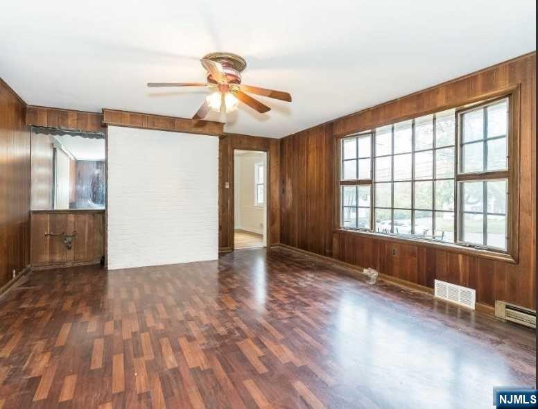 Colonial residence with spacious first level including a family room addition that could serve as a fourth bedroom. Close to Roseland Center and located on the 66-R Bus Line