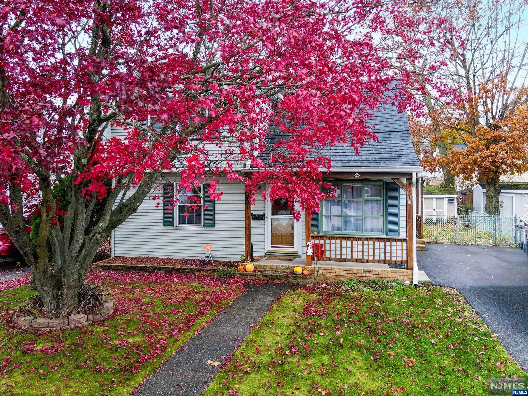 IF AN ENCHANTING KITCHEN IS WHAT YOU'RE LOOKING FOR, THEN SEARCH NO MORE! This Center Hall Colonial features a marvelous kitchen with cathedral ceilings, skylights, updated stainless-steel appliances, tons of cabinetry, captivating floor design & a walkout to the deck! If that wasn't enough to capture your attention, then the following modernizations absolutely will ... hardwood floors throughout the home, custom window treatments, recessed lighting, and much more! The backyard boasts a large deck, additional patio below, fenced in garden area, storage shed, walk-out to the driveway for all of your entertaining purposes. Basement may be finished or continue to use for plenty of storage. Walking distance to the park, transportation, schools, shopping and places of worship, within 5 minutes of Interstate 287. Be sure to preview the 3-D virtual tour & Seller's Disclosure for more info! Present all offers w/pre-approval or proof of funds. SCHEDULE YOUR PRIVATE APPOINTMENT NOW!