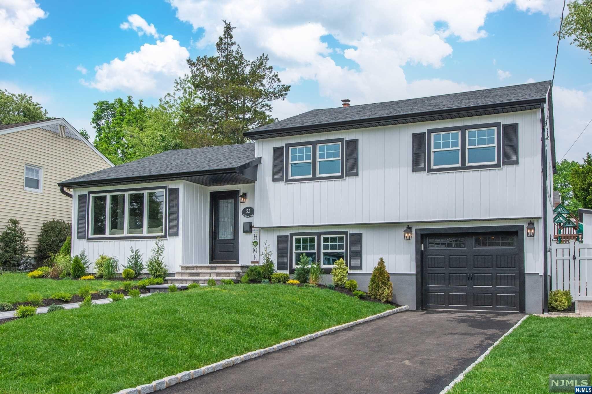 Welcome to this stunning split-level home located in the charming town of Bloomfield, NJ! This beautifully renovated home boasts a number of impressive features that are sure to impress including freshly painted and new interior doors. Step inside and you'll find a bright and spacious living room with a cozy gas fireplace and vaulted ceilings. The dining room and kitchen are both beautifully appointed, with a center island that's perfect for entertaining guests. And, with a TV and surround sound system included, you'll be able to enjoy your favorite movies. Head downstairs to the ground level and you'll find a laundry room, half bath, and den. Upstairs on the 2nd floor, you'll find three comfortable bedrooms, full bath, and a master bath and walk-in closet. The basement is fully finished with storage room. Stunning stone patio that awaits you outside. Complete with an outdoor kitchen and fireplace. Plus, the new storage shed. This is a must see!
