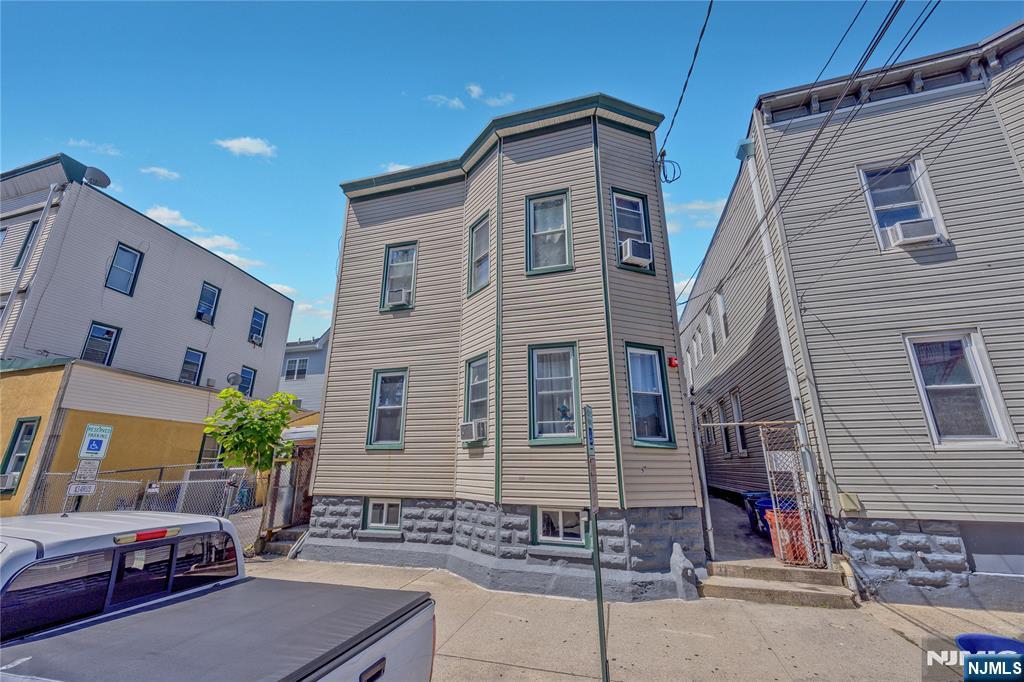 Exceptional investment opportunity in the heart of Passaic! Welcome to 9 Vreeland Ave, a well-maintained four-family property featuring four spacious units, each offering 2 generously sized bedrooms, a bright living room, and an eat-in kitchen. Whether you're an investor looking to add a strong income-producing property to your portfolio or an owner-occupant seeking to live in one unit while generating rental income from the others, this property offers endless potential. Conveniently located near supermarkets, shopping centers, restaurants, schools, parks, and public transportation, with easy access to major highways, making commuting throughout Northern New Jersey and New York City a breeze. Don't miss this incredible opportunity to own a versatile multi-family property in a prime Passaic location with strong rental demand and long-term investment potential!